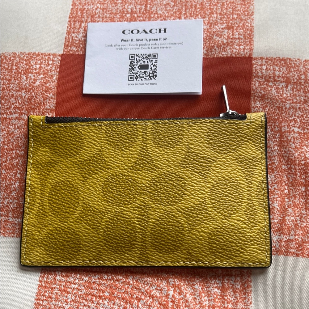 Coach Yellow Pebbled Leather Zip Pouch Wristlet